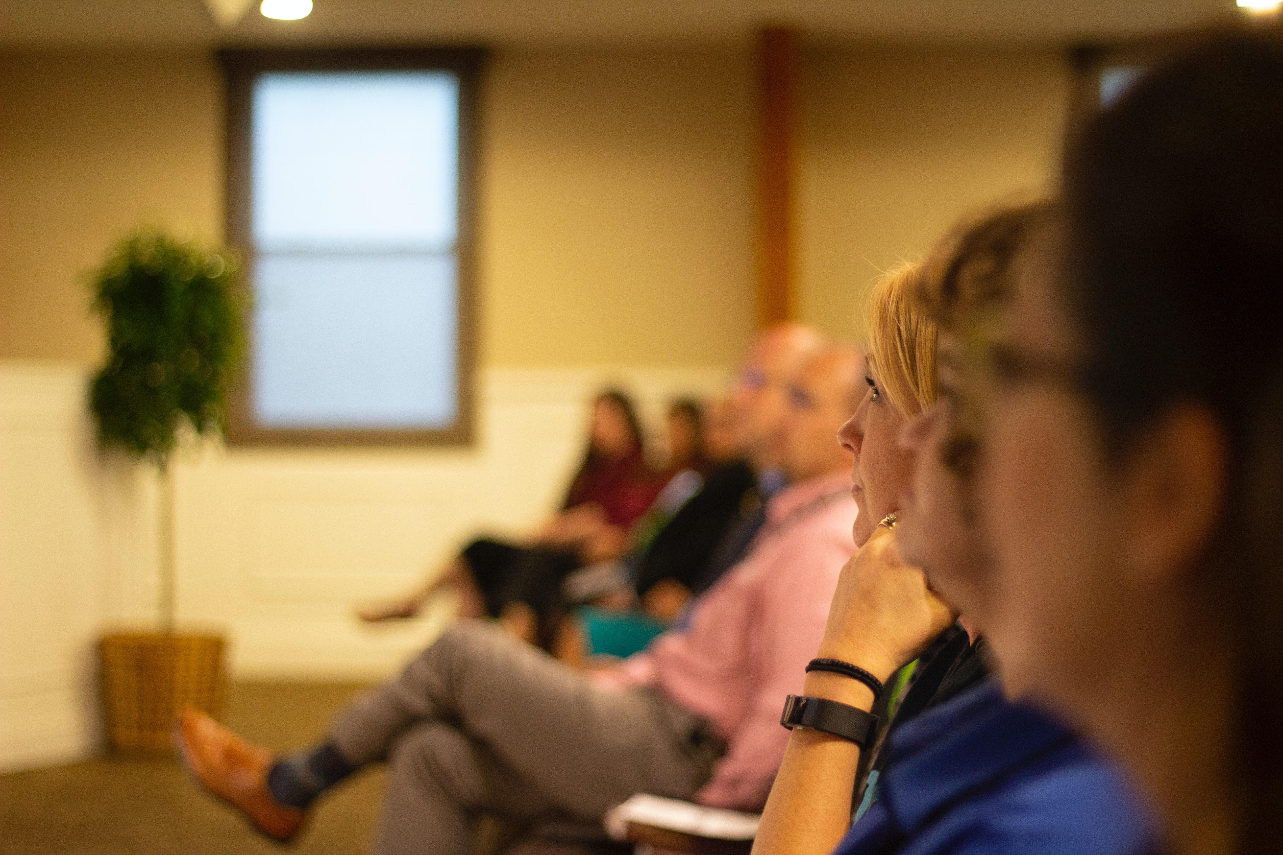 A group of people at a conference